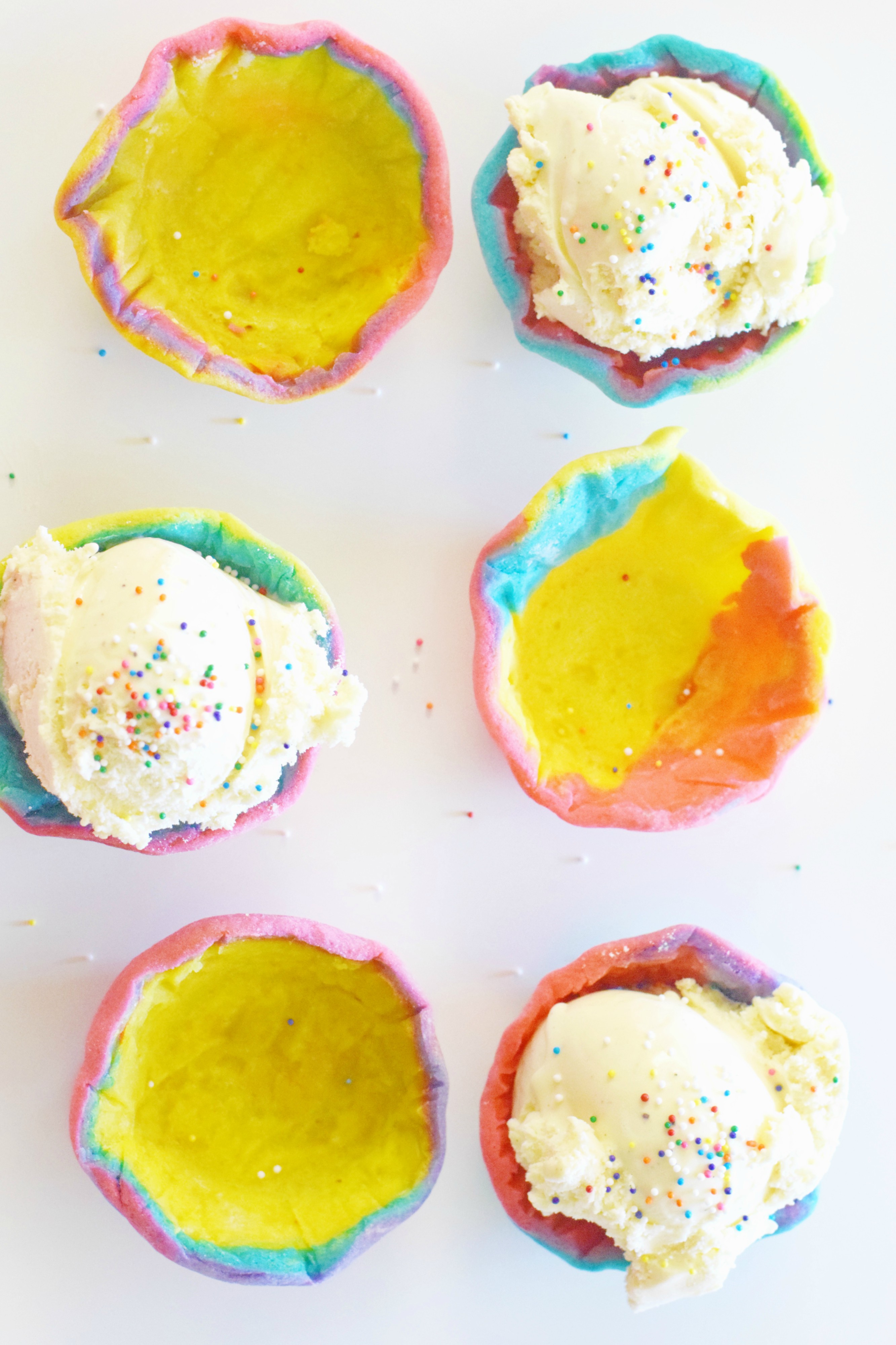 Rainbow Sugar Cookie Bowls - Rainbow Recipe - Cookie Dough Bowls - Easy Recipe For Kids - Dessert Ideas - Unicorn Party - Rainbow Dessert - Recipe - Communikait by Kait Hanson