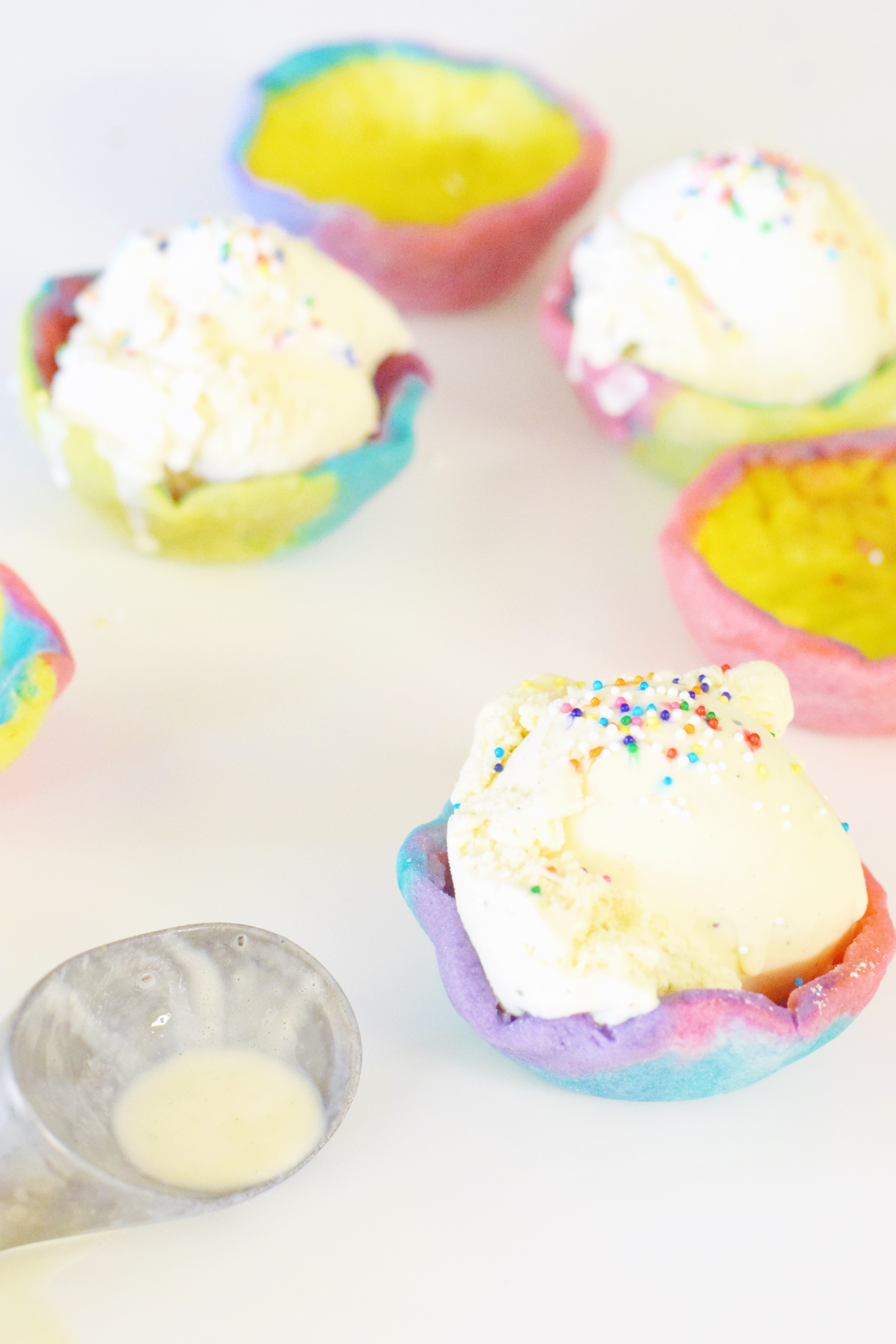 Rainbow Sugar Cookie Bowls - Rainbow Recipe - Cookie Dough Bowls - Easy Recipe For Kids - Dessert Ideas - Unicorn Party - Rainbow Dessert - Recipe - Communikait by Kait Hanson