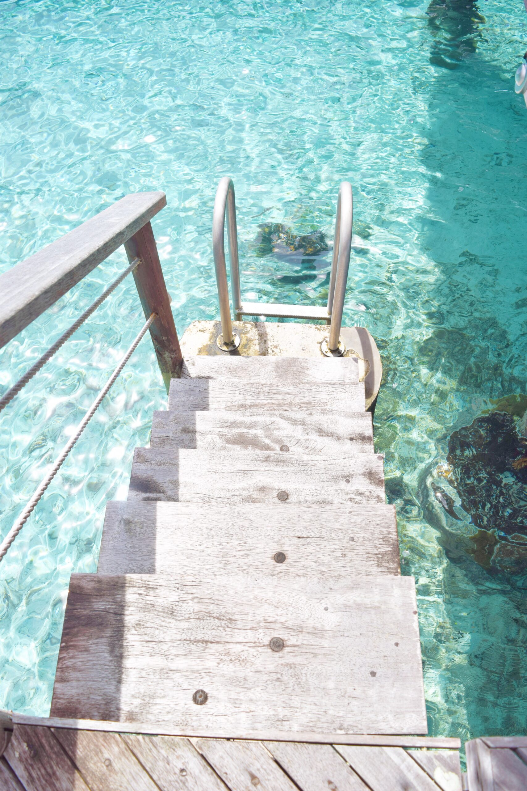 Ocean steps off overwater bungalow